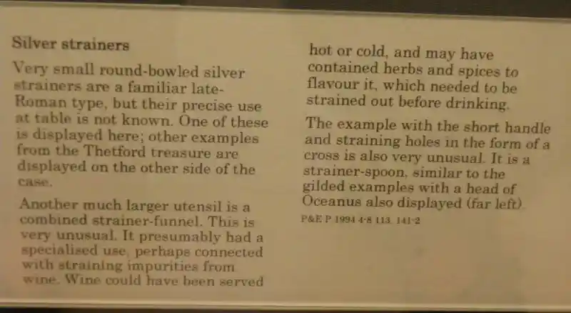 Silver strainer-spoon with straining holes in the form of a cross